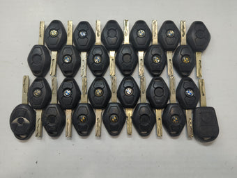 compare product Lot of 25 Bmw Keyless Entry Remote Fob MIXED FCC IDS MIXED PART NUMBERS