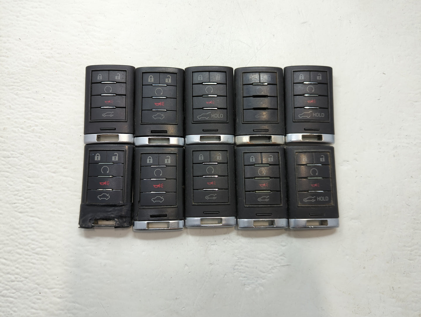 Lot of 10 Cadillac Keyless Entry Remote Fob MIXED FCC IDS MIXED PART - Oemusedautoparts1.com