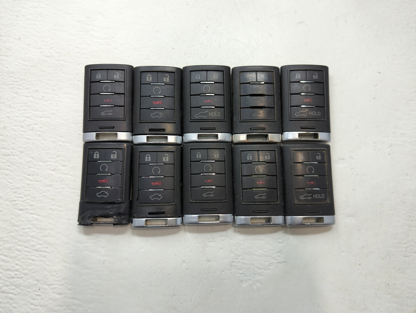 Lot of 10 Cadillac Keyless Entry Remote Fob MIXED FCC IDS MIXED PART - Oemusedautoparts1.com