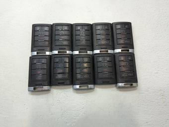 compare product Lot of 10 Cadillac Keyless Entry Remote Fob MIXED FCC IDS MIXED PART