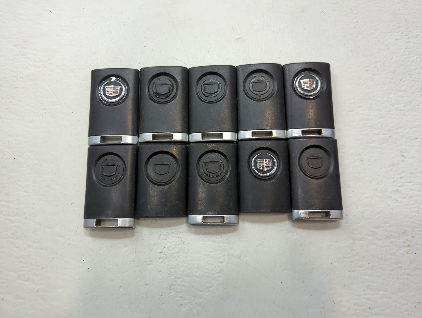 Lot of 10 Cadillac Keyless Entry Remote Fob MIXED FCC IDS MIXED PART - Oemusedautoparts1.com