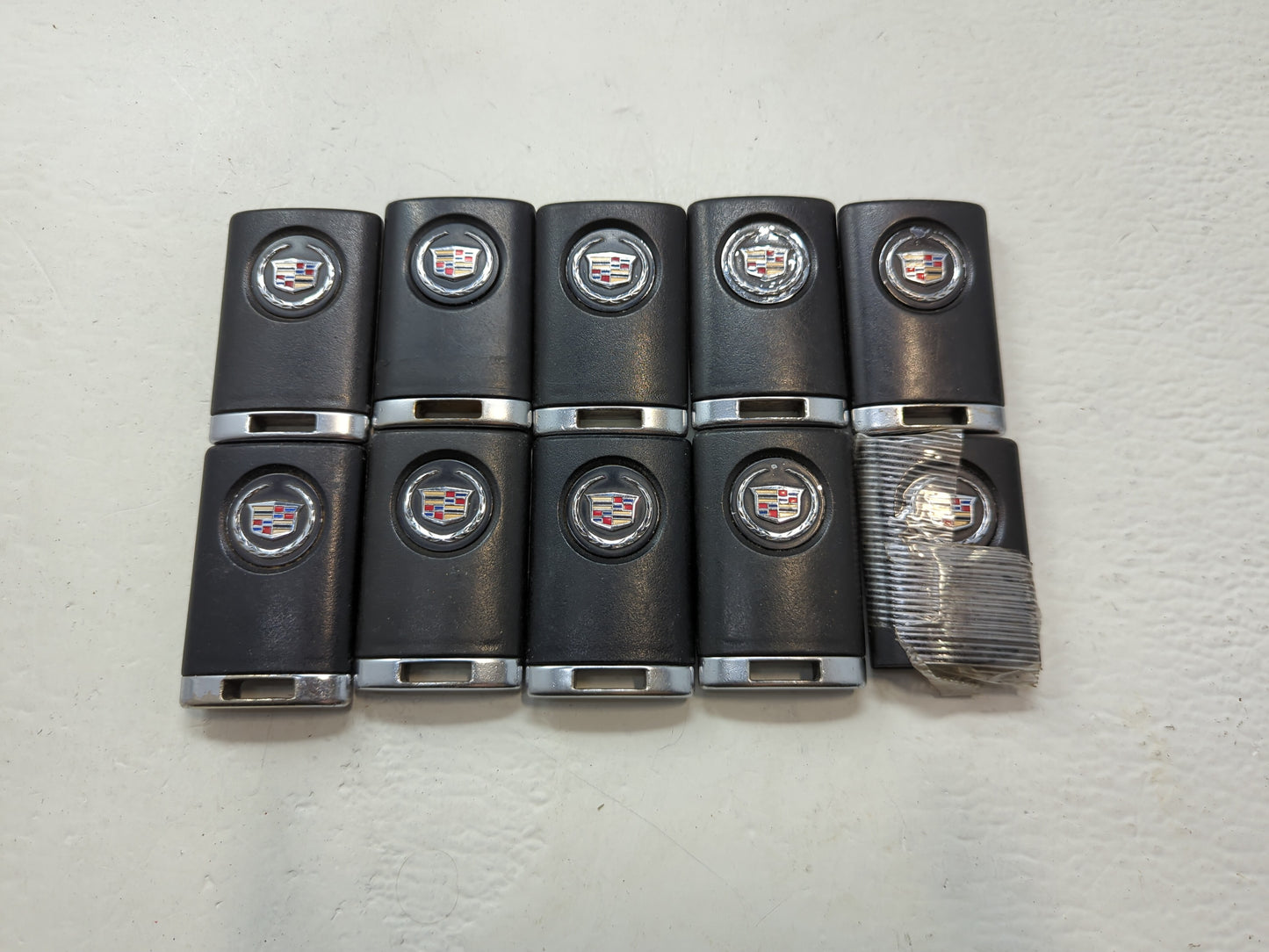 Lot of 10 Cadillac Keyless Entry Remote Fob MIXED FCC IDS MIXED PART - Oemusedautoparts1.com