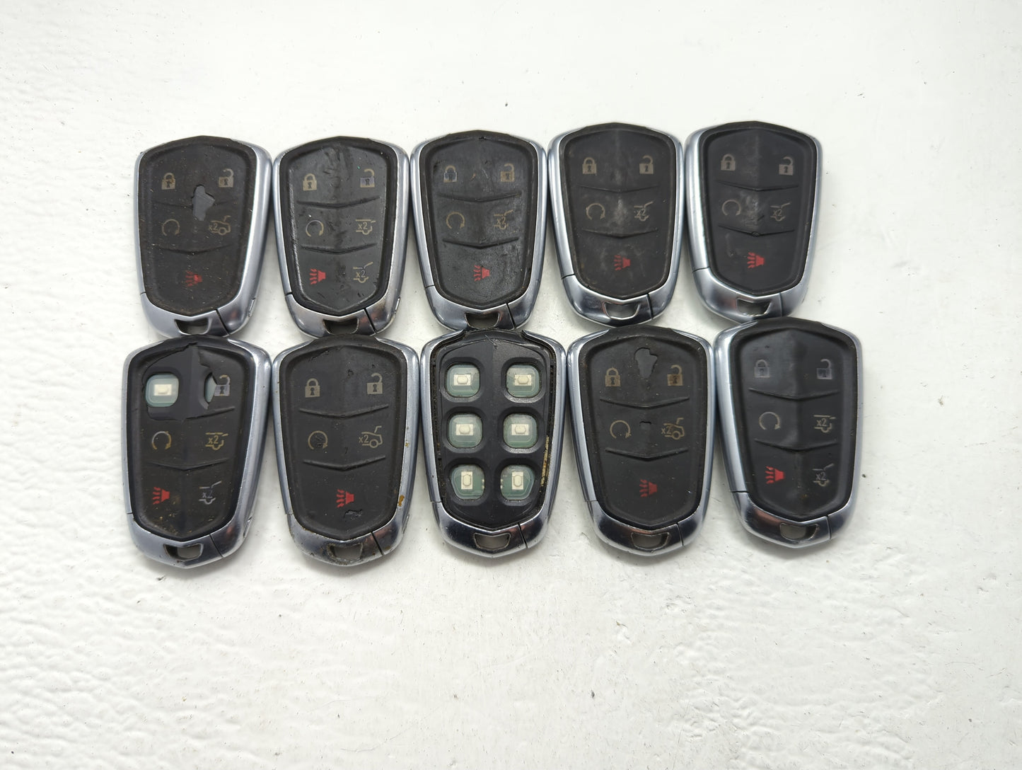 Lot of 10 Cadillac Keyless Entry Remote Fob MIXED FCC IDS MIXED PART - Oemusedautoparts1.com