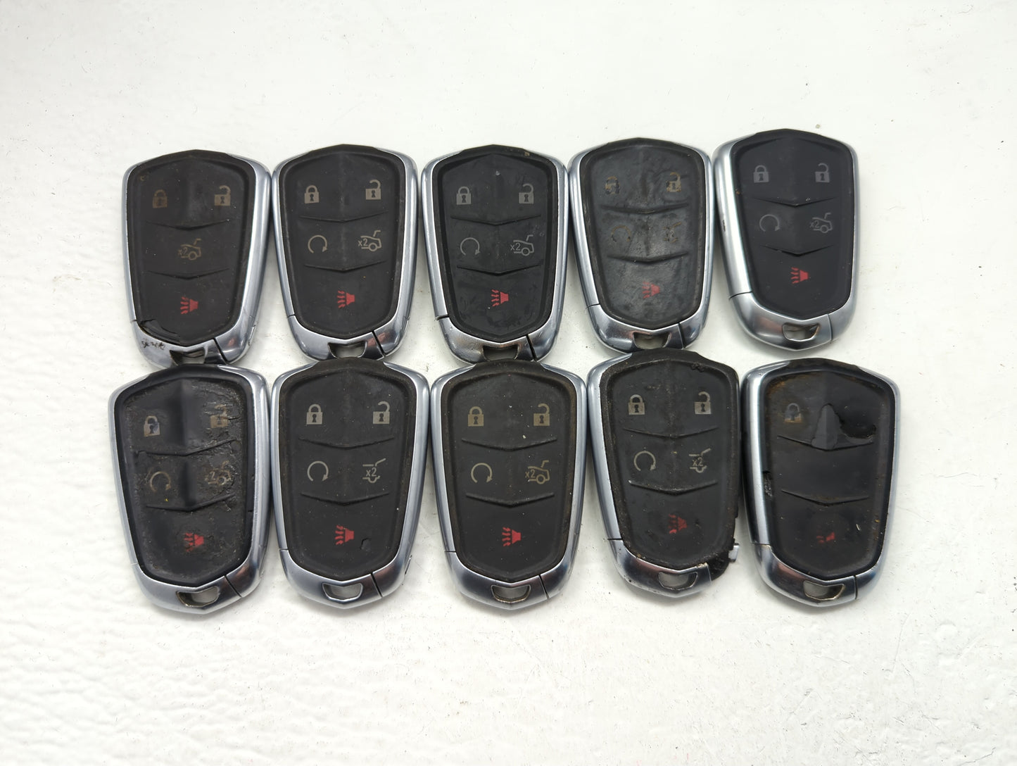 Lot of 10 Cadillac Keyless Entry Remote Fob MIXED FCC IDS MIXED PART - Oemusedautoparts1.com