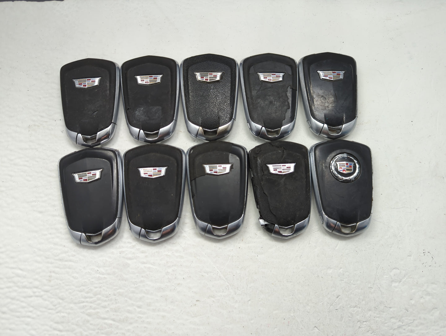 Lot of 10 Cadillac Keyless Entry Remote Fob MIXED FCC IDS MIXED PART - Oemusedautoparts1.com