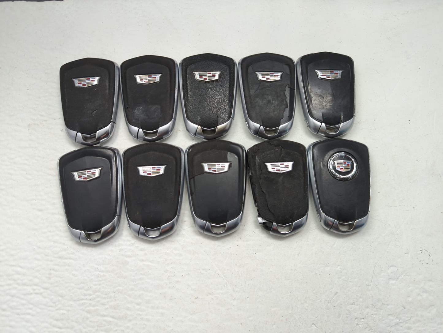 Lot of 10 Cadillac Keyless Entry Remote Fob MIXED FCC IDS MIXED PART - Oemusedautoparts1.com