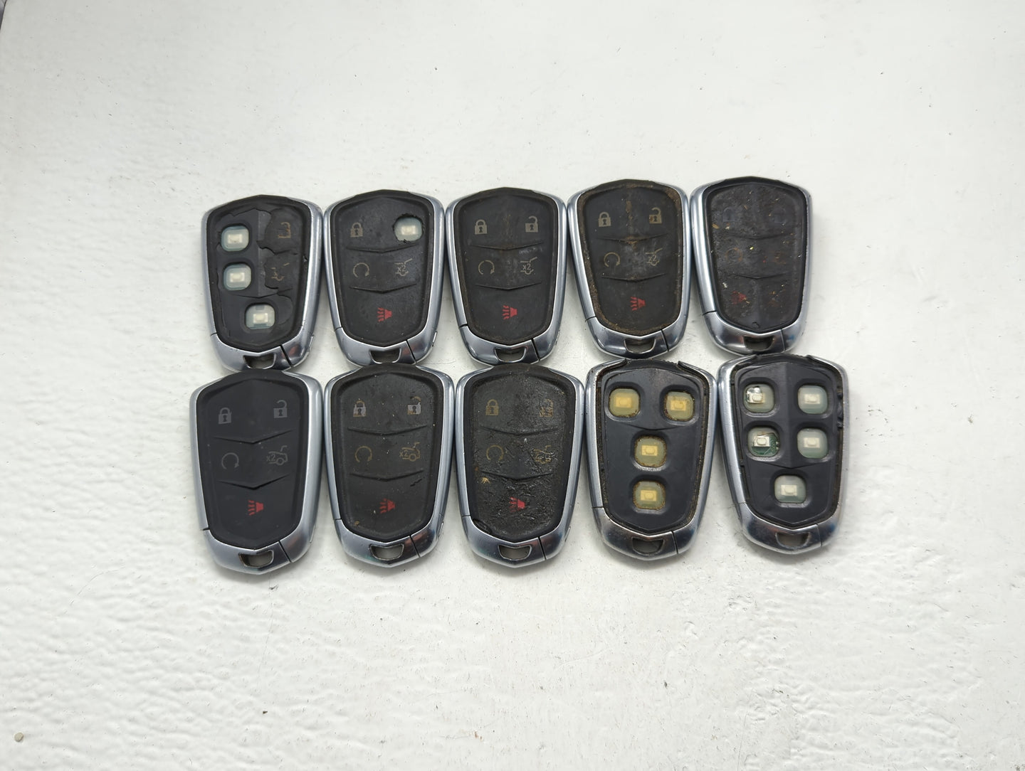 Lot of 10 Cadillac Keyless Entry Remote Fob MIXED FCC IDS MIXED PART - Oemusedautoparts1.com