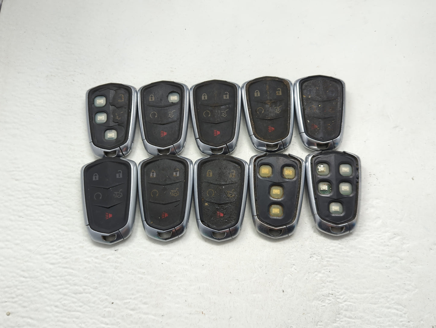 Lot of 10 Cadillac Keyless Entry Remote Fob MIXED FCC IDS MIXED PART - Oemusedautoparts1.com