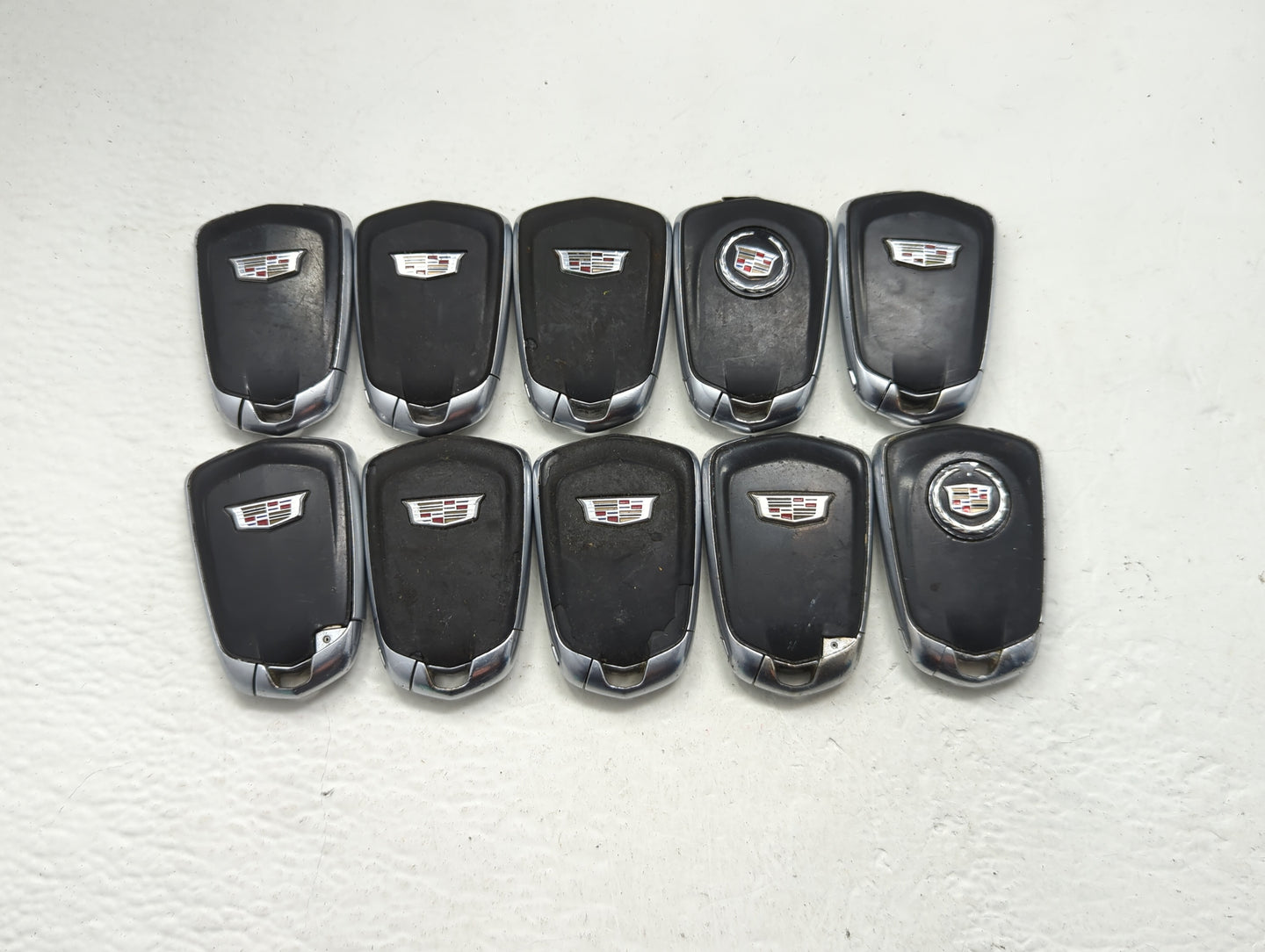 Lot of 10 Cadillac Keyless Entry Remote Fob MIXED FCC IDS MIXED PART - Oemusedautoparts1.com