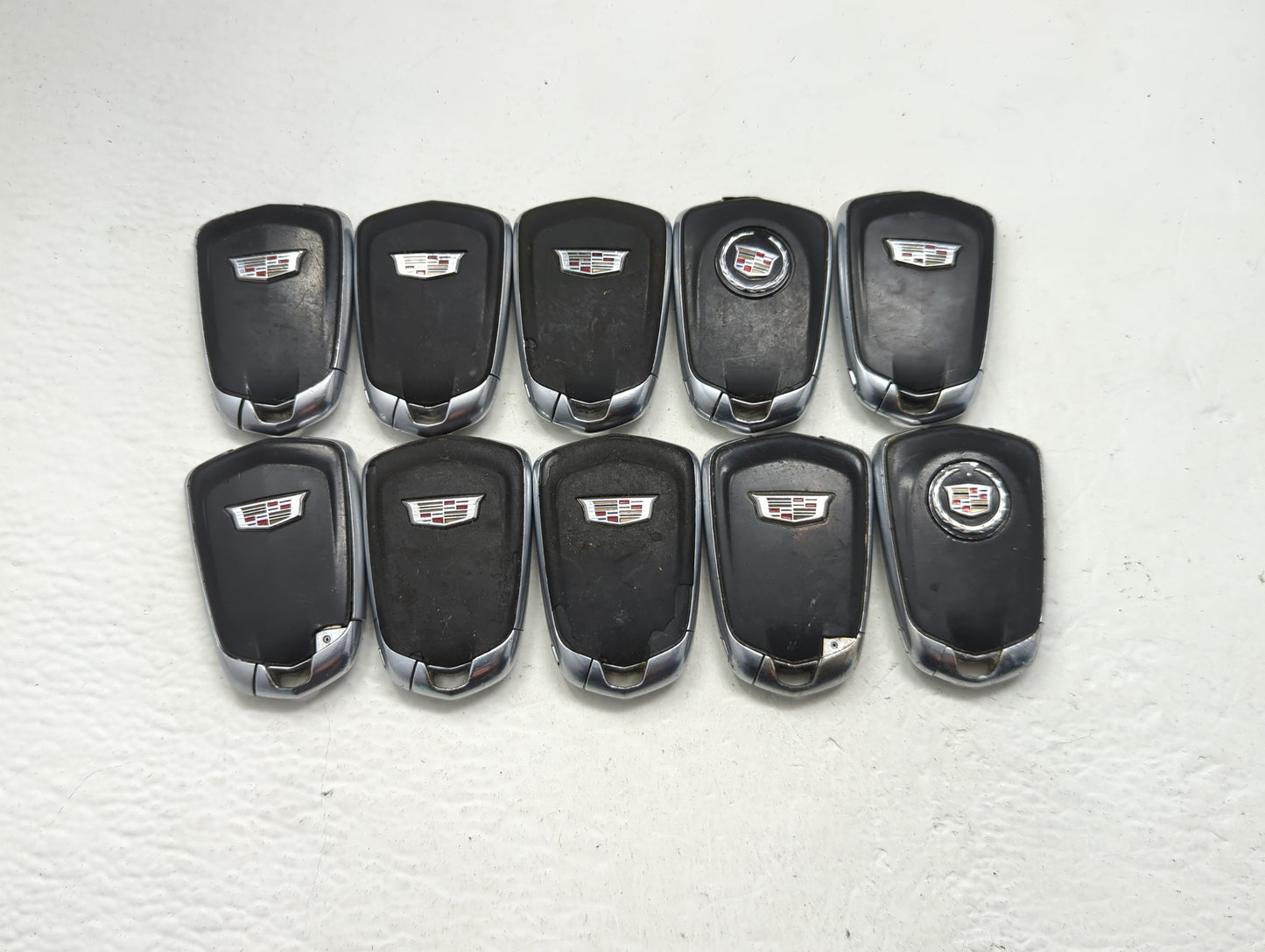 Lot of 10 Cadillac Keyless Entry Remote Fob MIXED FCC IDS MIXED PART - Oemusedautoparts1.com