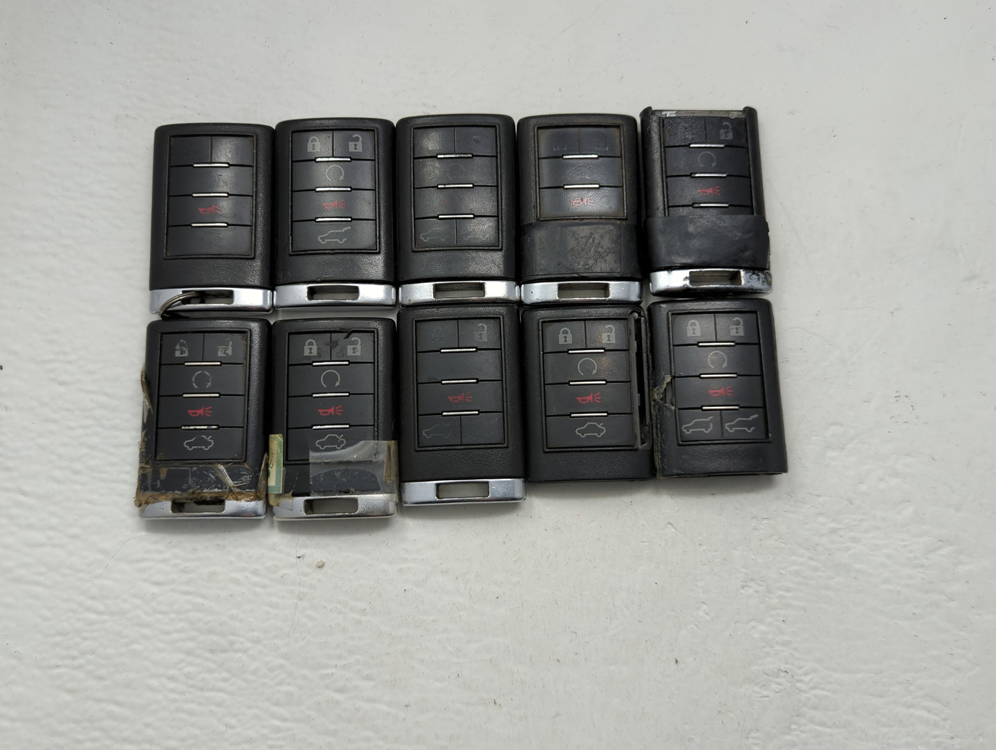 Lot of 10 Cadillac Keyless Entry Remote Fob MIXED FCC IDS MIXED PART - Oemusedautoparts1.com