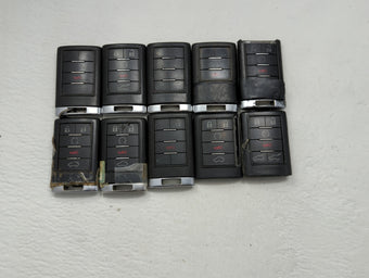 compare product Lot of 10 Cadillac Keyless Entry Remote Fob MIXED FCC IDS MIXED PART
