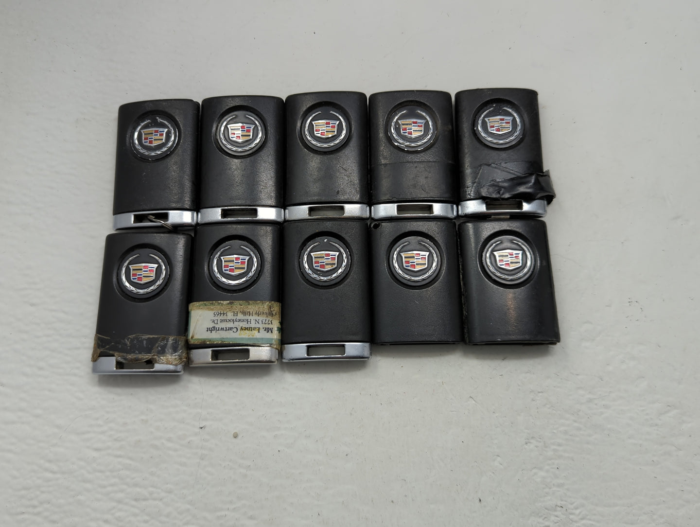 Lot of 10 Cadillac Keyless Entry Remote Fob MIXED FCC IDS MIXED PART - Oemusedautoparts1.com