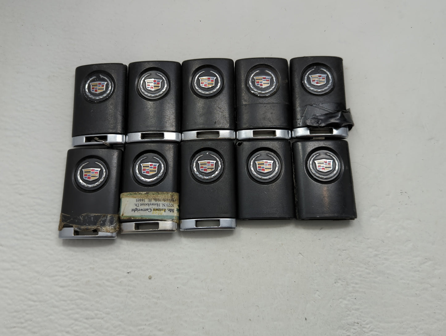 Lot of 10 Cadillac Keyless Entry Remote Fob MIXED FCC IDS MIXED PART - Oemusedautoparts1.com