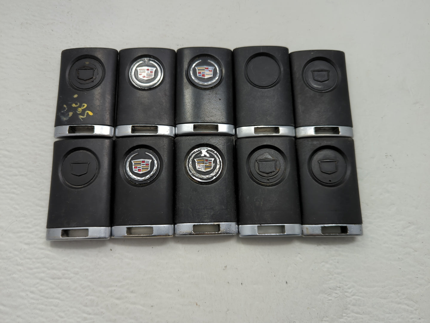 Lot of 10 Cadillac Keyless Entry Remote Fob MIXED FCC IDS MIXED PART - Oemusedautoparts1.com