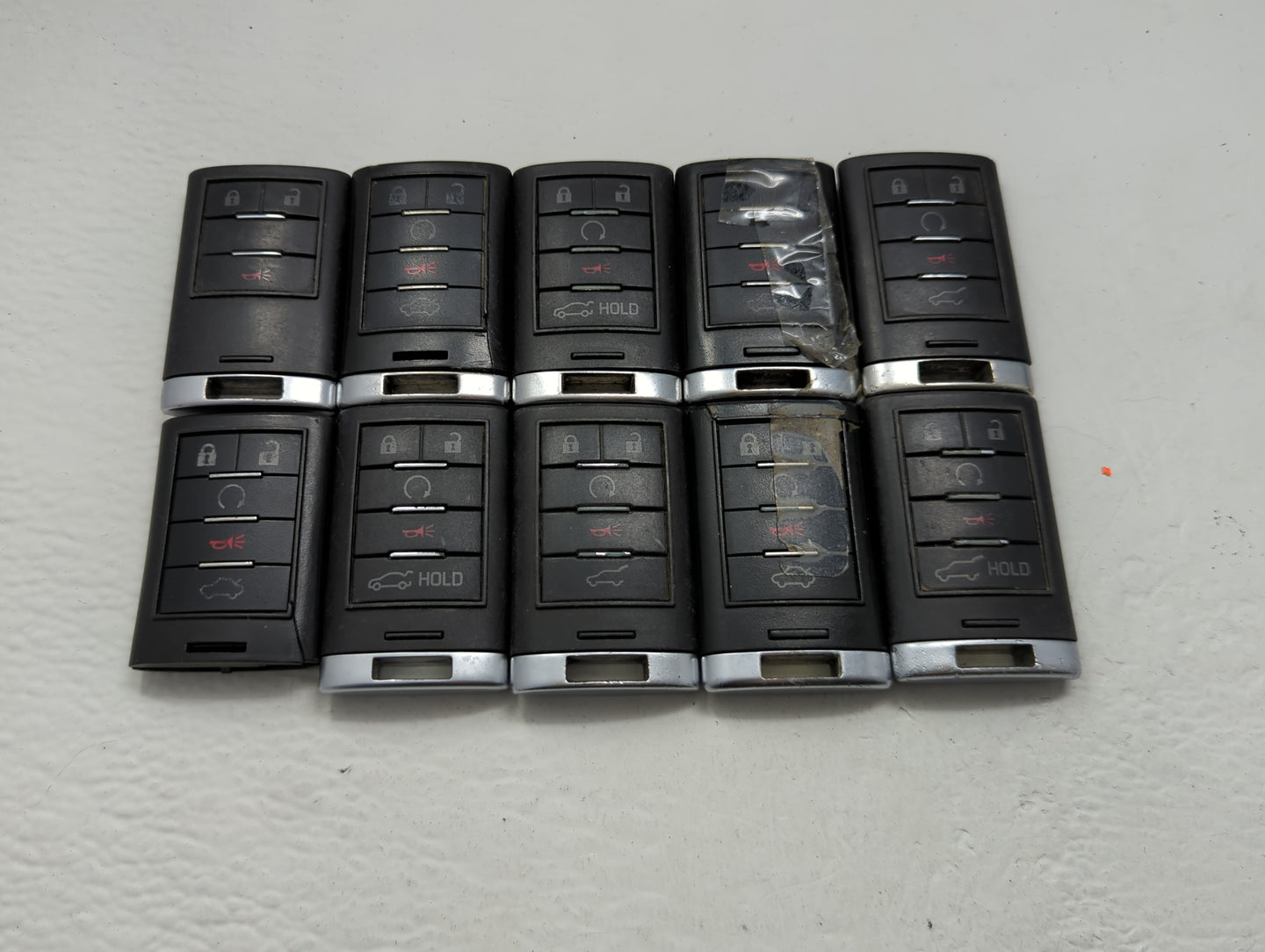 Lot of 10 Cadillac Keyless Entry Remote Fob MIXED FCC IDS MIXED PART - Oemusedautoparts1.com