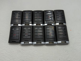 compare product Lot of 10 Cadillac Keyless Entry Remote Fob MIXED FCC IDS MIXED PART