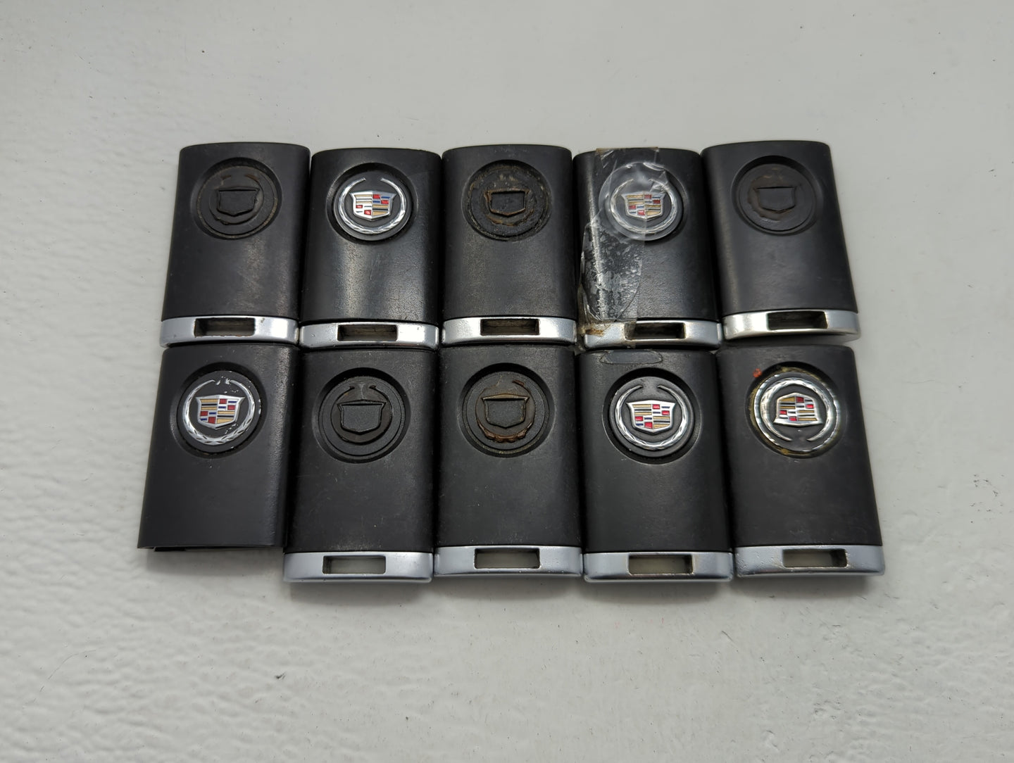 Lot of 10 Cadillac Keyless Entry Remote Fob MIXED FCC IDS MIXED PART - Oemusedautoparts1.com