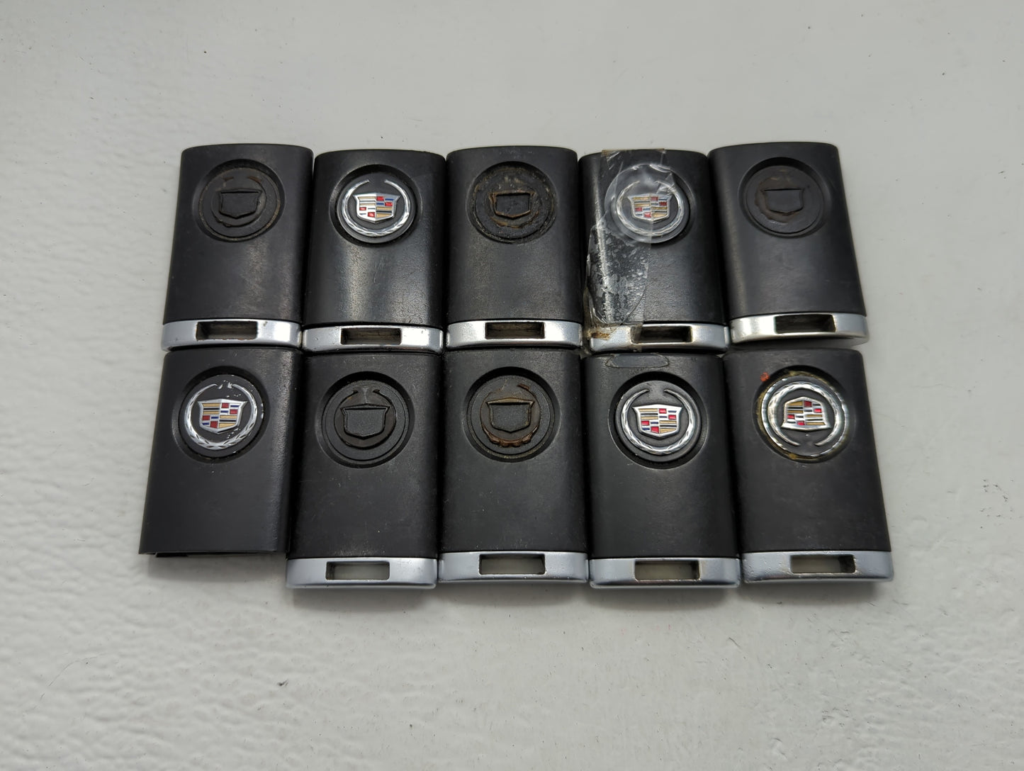 Lot of 10 Cadillac Keyless Entry Remote Fob MIXED FCC IDS MIXED PART - Oemusedautoparts1.com
