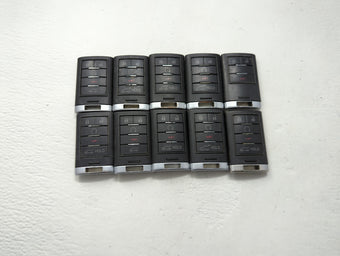 compare product Lot of 10 Cadillac Keyless Entry Remote Fob MIXED FCC IDS MIXED PART