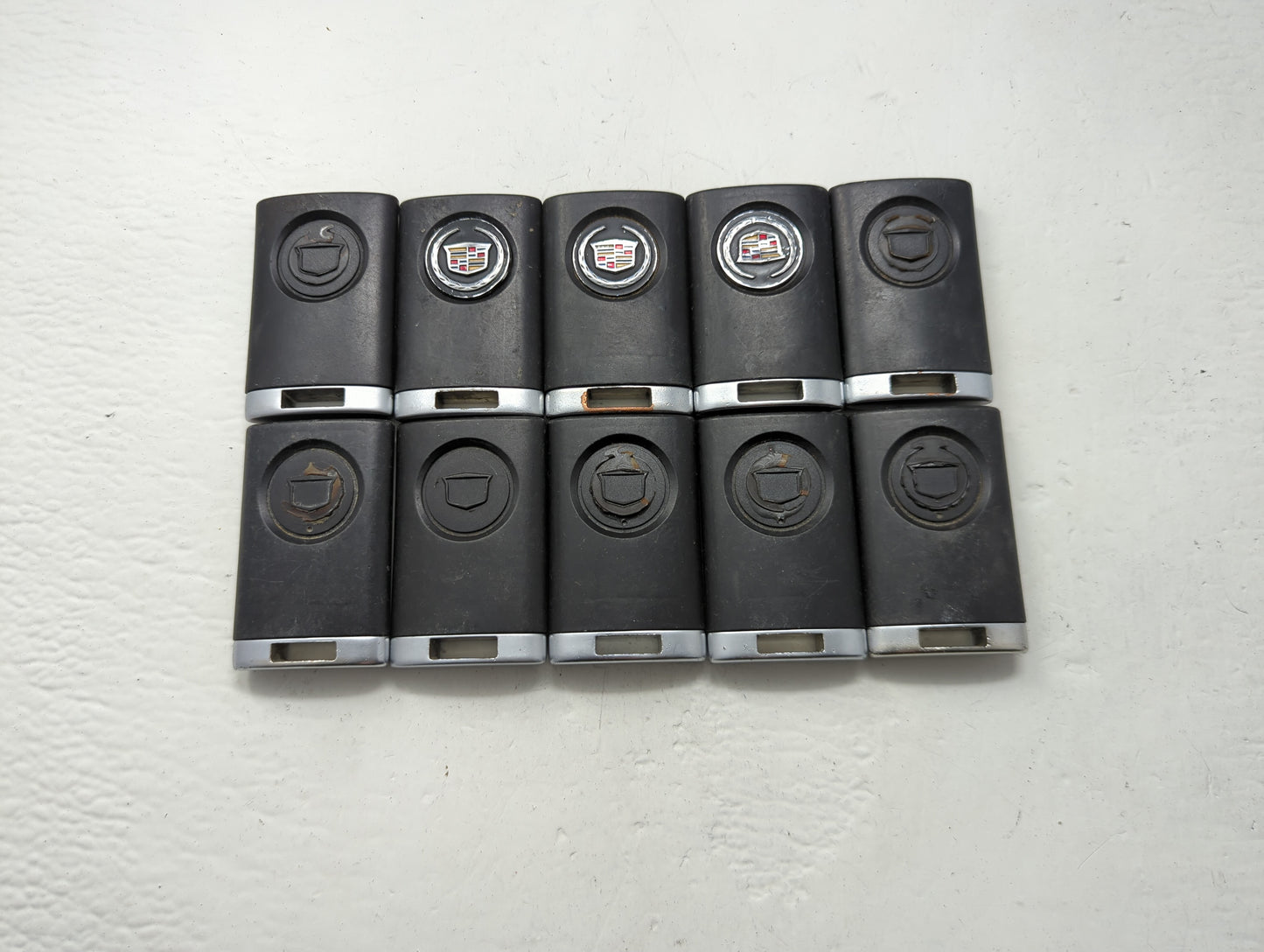 Lot of 10 Cadillac Keyless Entry Remote Fob MIXED FCC IDS MIXED PART - Oemusedautoparts1.com