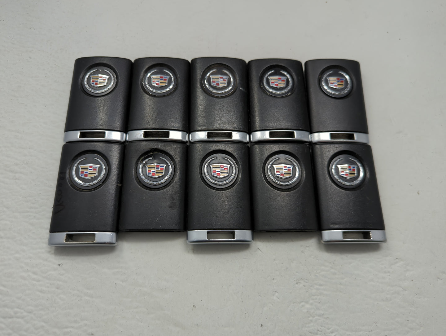 Lot of 10 Cadillac Keyless Entry Remote Fob OUC6000066 | OUC6000223 - Oemusedautoparts1.com