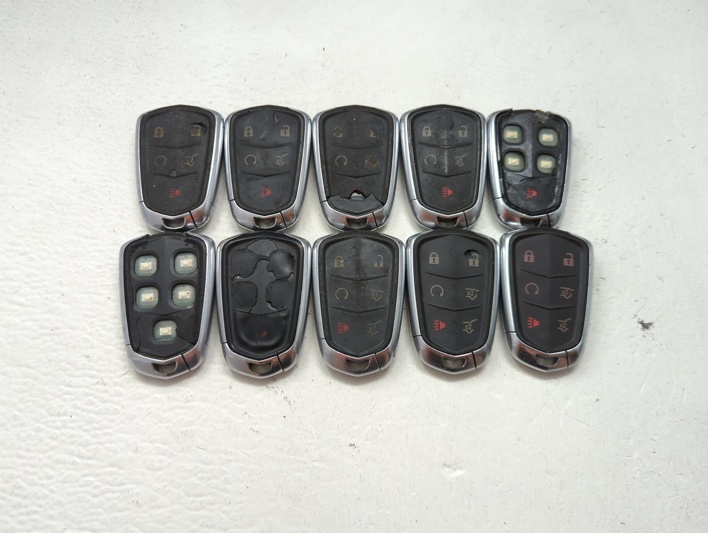 Lot of 10 Cadillac Keyless Entry Remote Fob MIXED FCC IDS MIXED PART 1476178 - Oemusedautoparts1.com