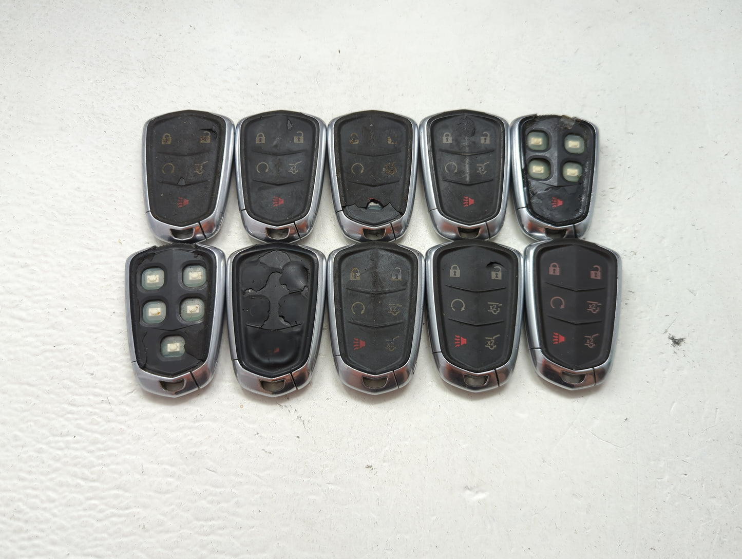 Lot of 10 Cadillac Keyless Entry Remote Fob MIXED FCC IDS MIXED PART 1476178 - Oemusedautoparts1.com