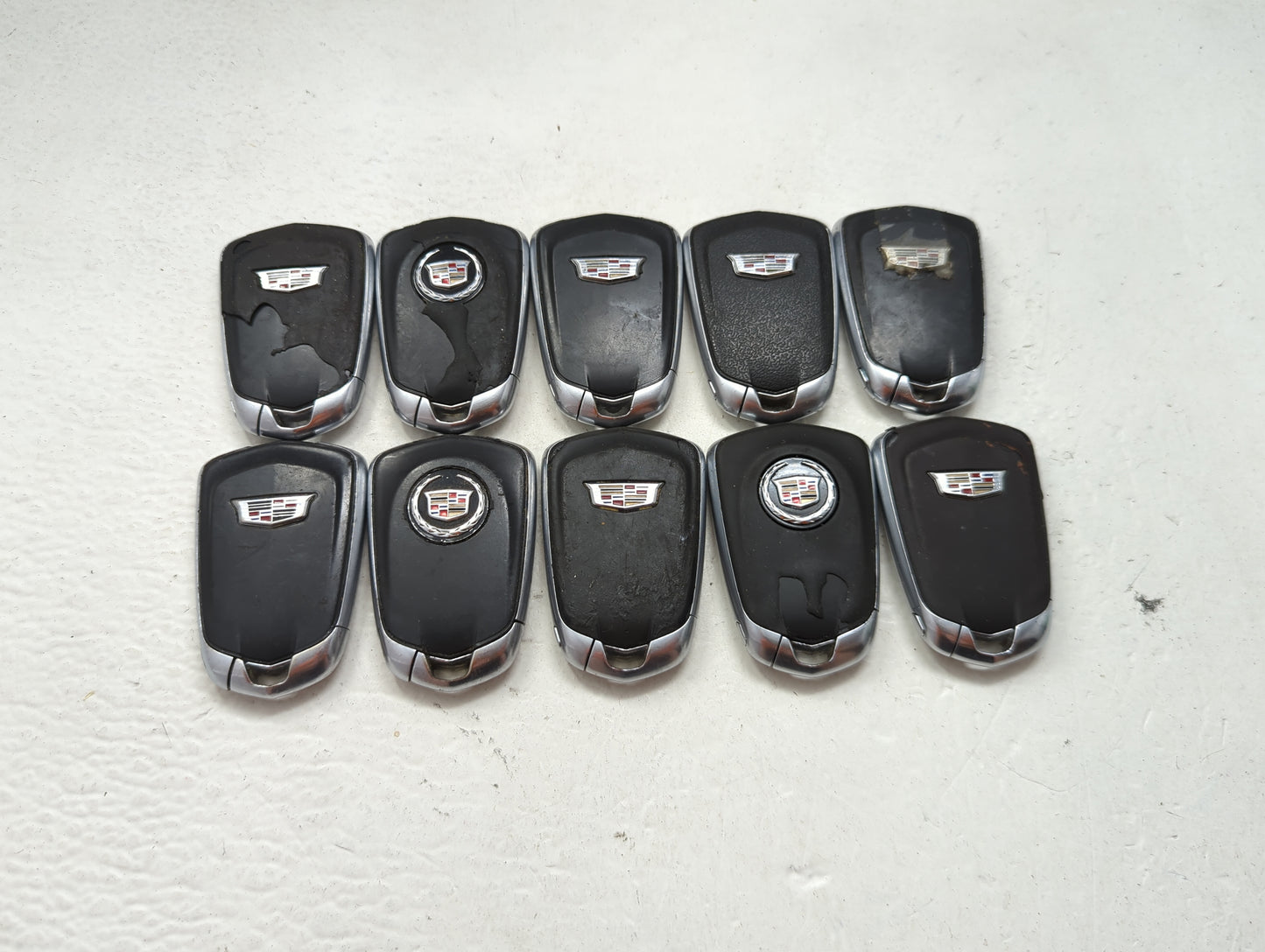Lot of 10 Cadillac Keyless Entry Remote Fob MIXED FCC IDS MIXED PART 1476178 - Oemusedautoparts1.com