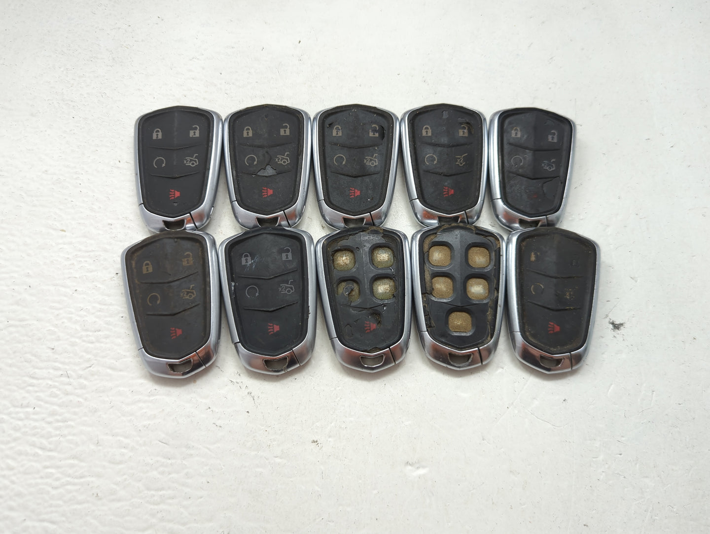 Lot of 10 Cadillac Keyless Entry Remote Fob MIXED FCC IDS MIXED PART 1476179 - Oemusedautoparts1.com