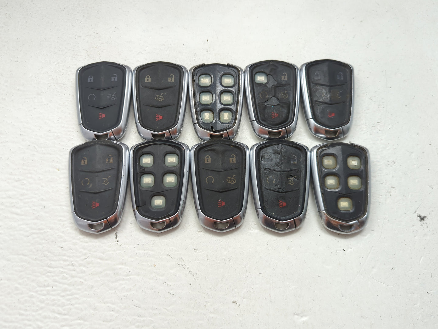 Lot of 10 Cadillac Keyless Entry Remote Fob MIXED FCC IDS MIXED PART 1476180 - Oemusedautoparts1.com