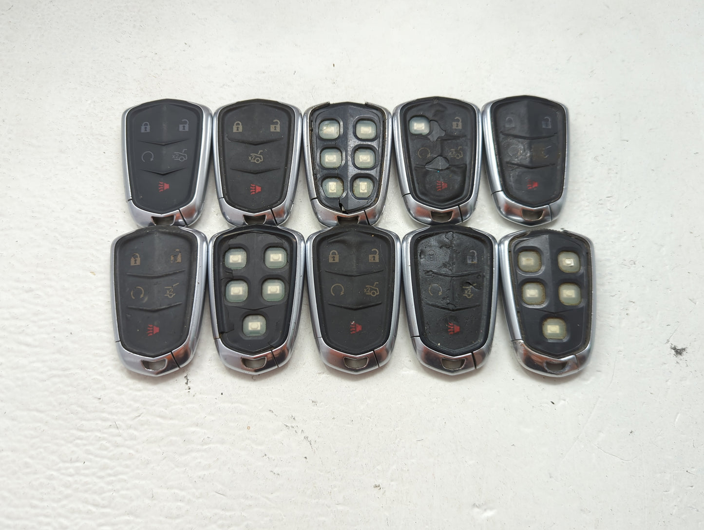 Lot of 10 Cadillac Keyless Entry Remote Fob MIXED FCC IDS MIXED PART 1476180 - Oemusedautoparts1.com