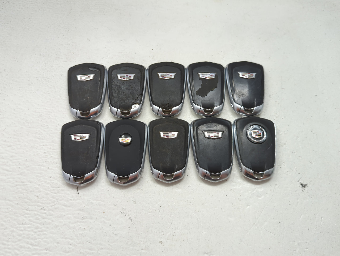 Lot of 10 Cadillac Keyless Entry Remote Fob MIXED FCC IDS MIXED PART 1476181 - Oemusedautoparts1.com