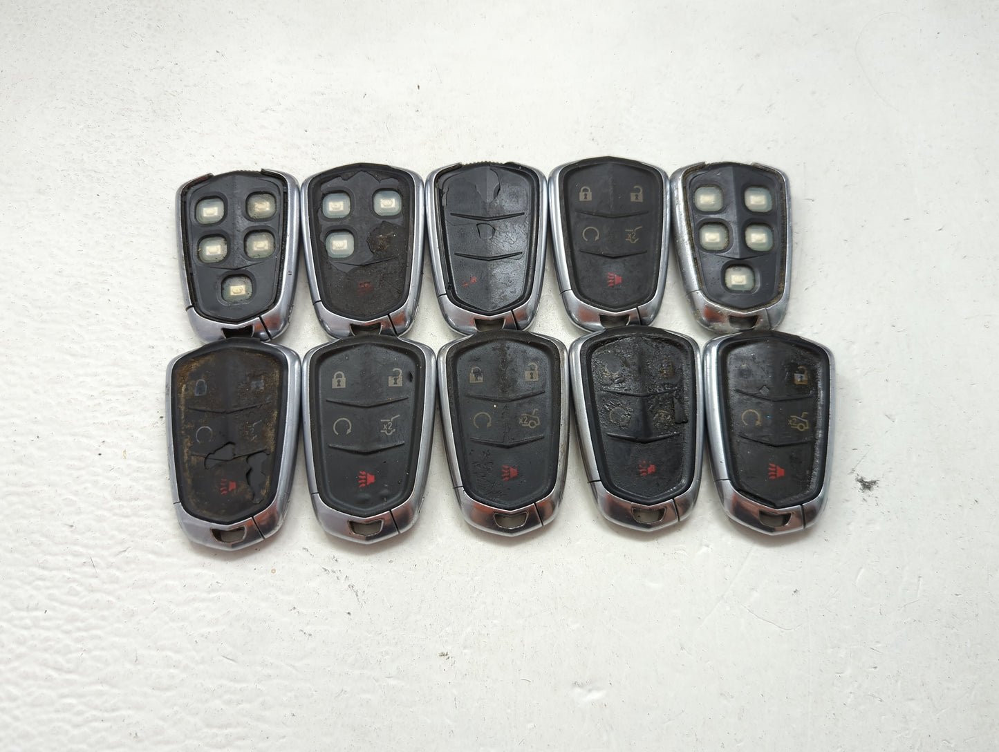 Lot of 10 Cadillac Keyless Entry Remote Fob MIXED FCC IDS MIXED PART 1476182 - Oemusedautoparts1.com