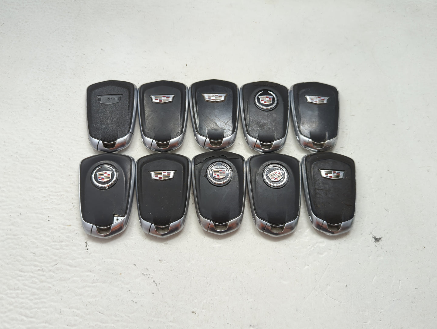 Lot of 10 Cadillac Keyless Entry Remote Fob MIXED FCC IDS MIXED PART 1476182 - Oemusedautoparts1.com