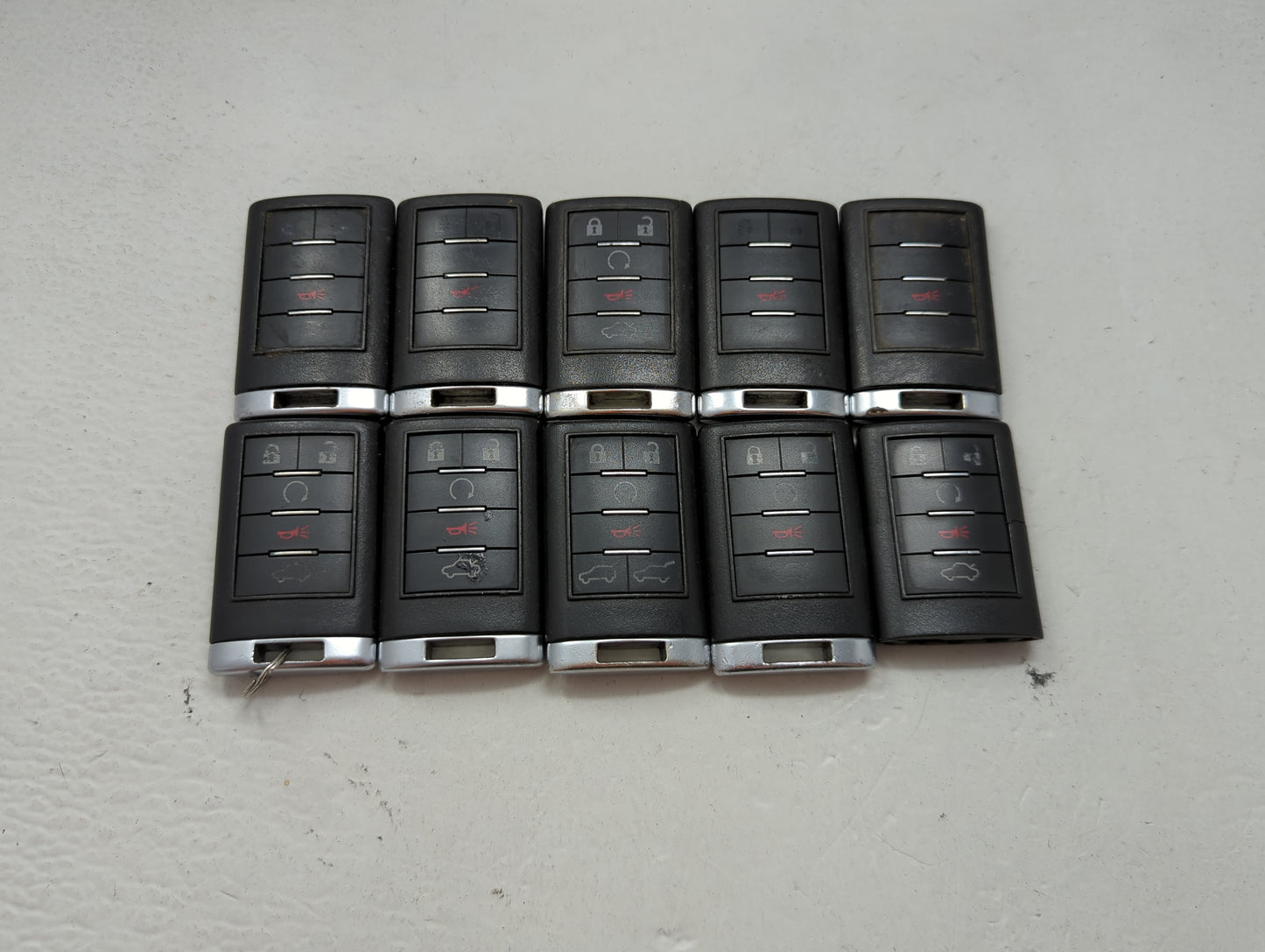 Lot of 10 Cadillac Keyless Entry Remote Fob MIXED FCC IDS MIXED PART 1476183 - Oemusedautoparts1.com