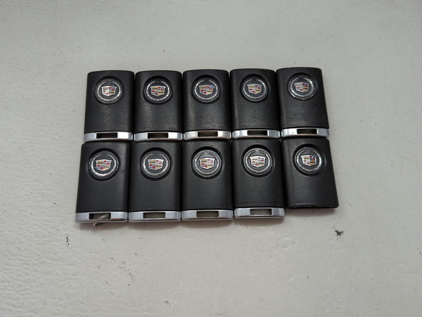 Lot of 10 Cadillac Keyless Entry Remote Fob MIXED FCC IDS MIXED PART 1476183 - Oemusedautoparts1.com