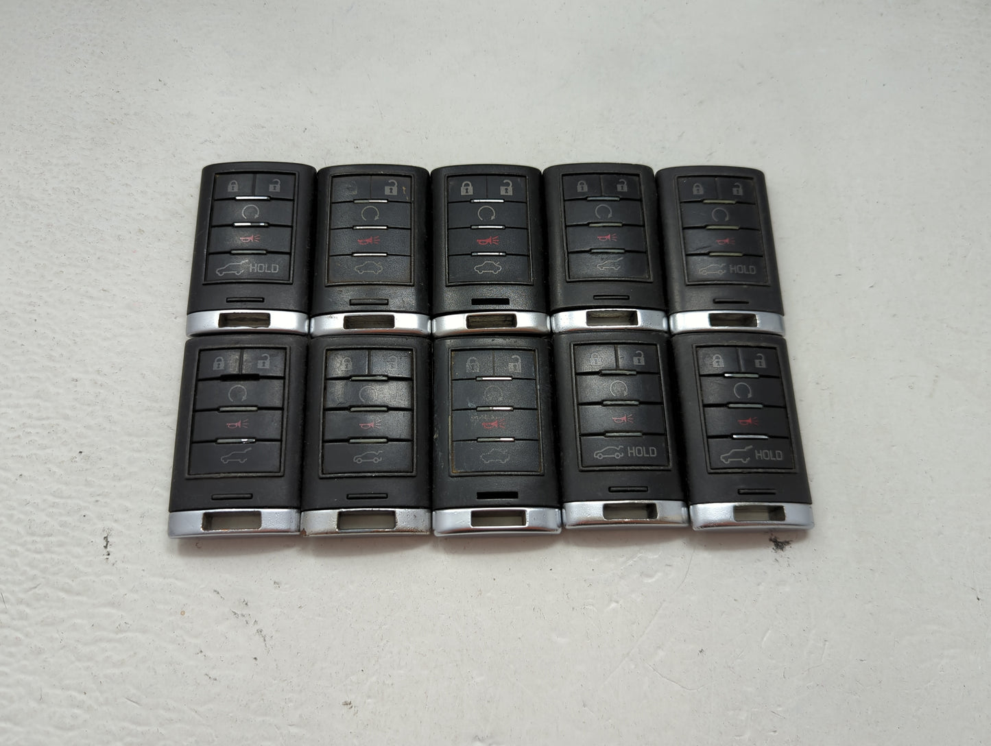 Lot of 10 Cadillac Keyless Entry Remote Fob MIXED FCC IDS MIXED PART 1476194 - Oemusedautoparts1.com