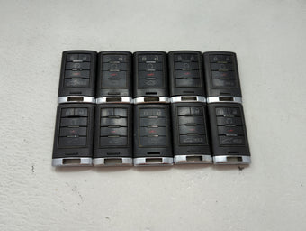 compare product Lot of 10 Cadillac Keyless Entry Remote Fob MIXED FCC IDS MIXED PART 1476194