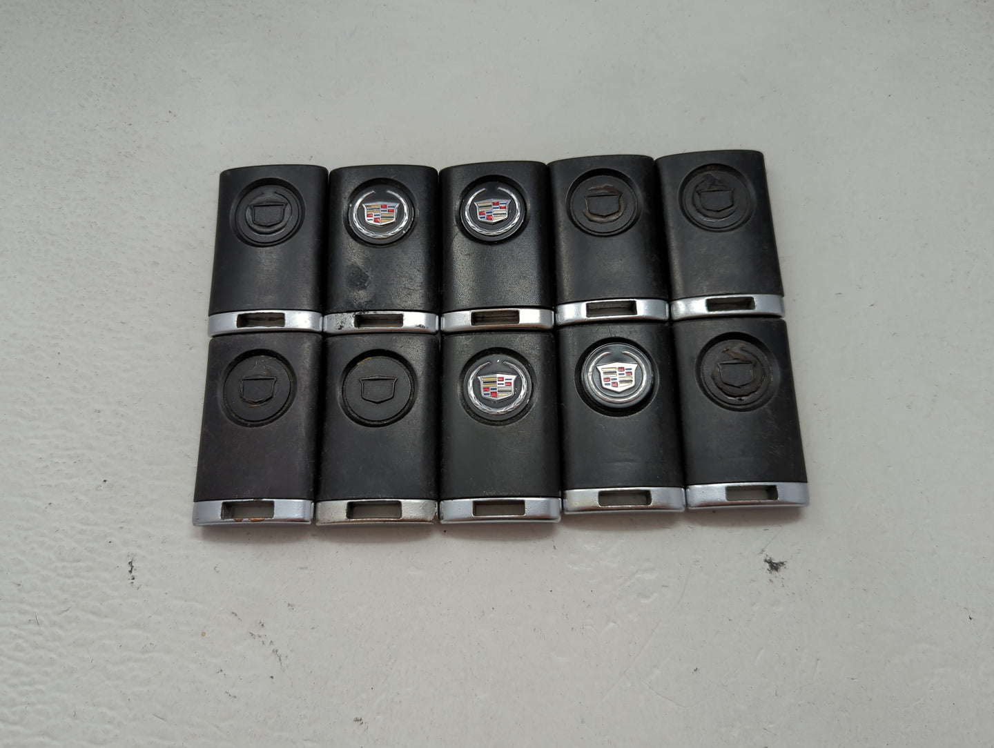 Lot of 10 Cadillac Keyless Entry Remote Fob MIXED FCC IDS MIXED PART 1476194 - Oemusedautoparts1.com