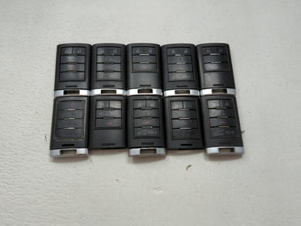 compare product Lot of 10 Cadillac Keyless Entry Remote Fob MIXED FCC IDS MIXED PART 1476195