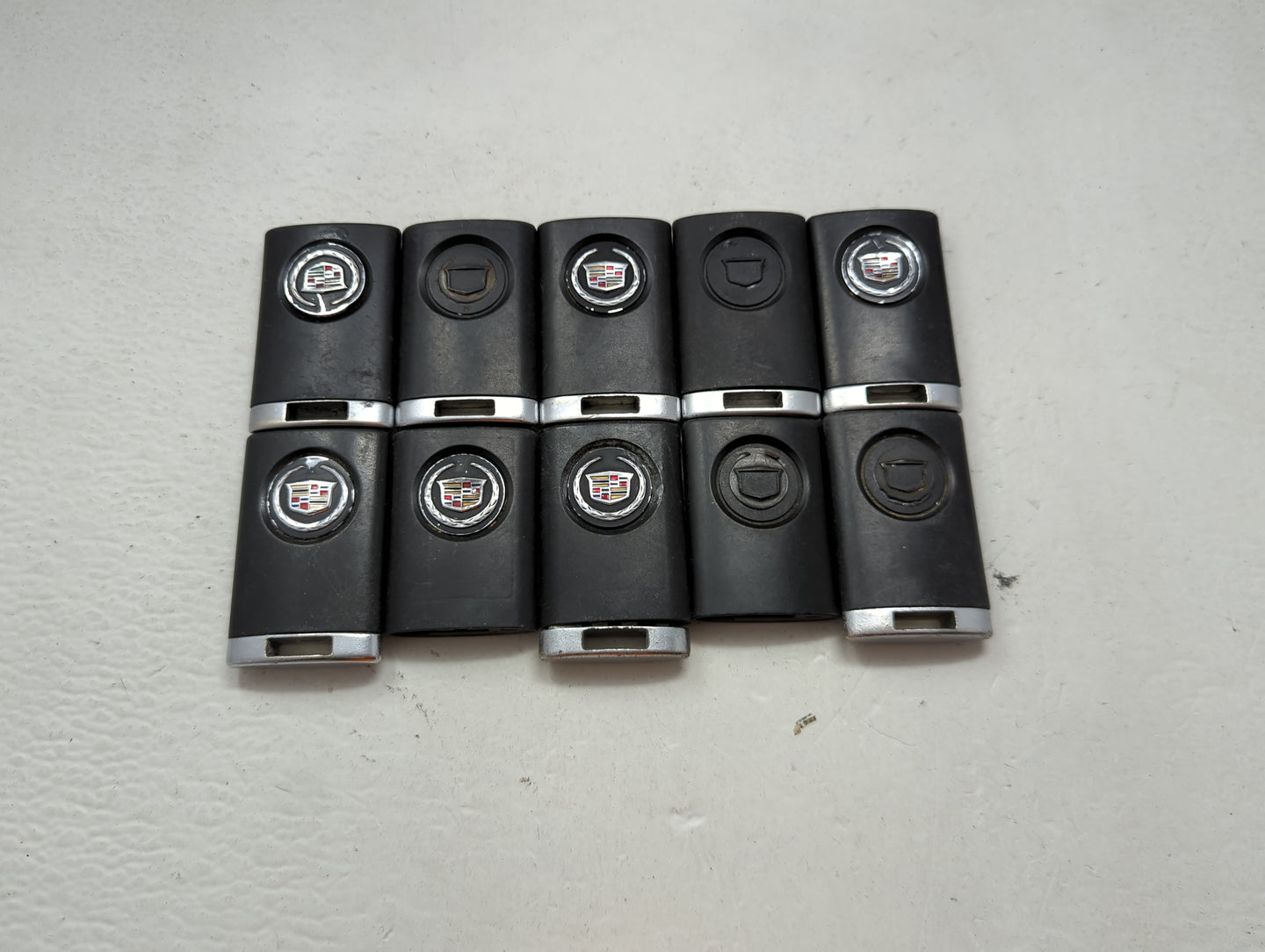 Lot of 10 Cadillac Keyless Entry Remote Fob MIXED FCC IDS MIXED PART 1476195 - Oemusedautoparts1.com