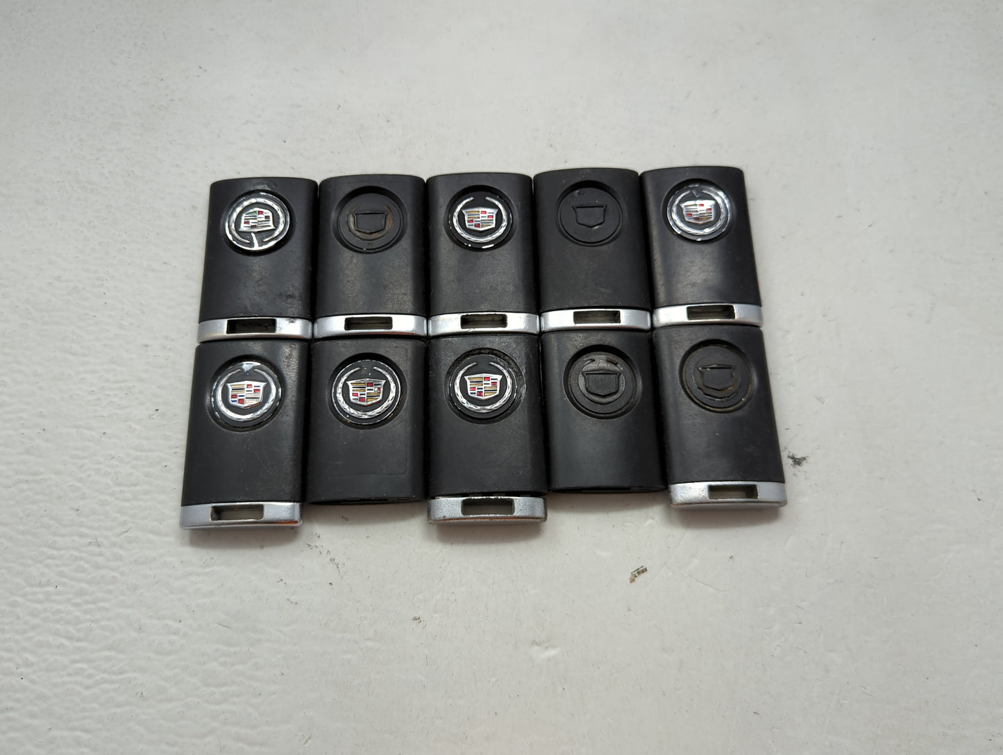 Lot of 10 Cadillac Keyless Entry Remote Fob MIXED FCC IDS MIXED PART 1476195 - Oemusedautoparts1.com