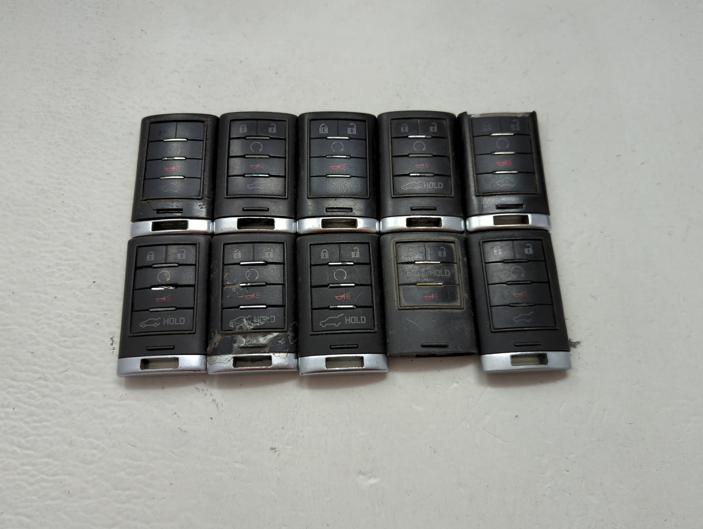 Lot of 10 Cadillac Keyless Entry Remote Fob MIXED FCC IDS MIXED PART 1476196 - Oemusedautoparts1.com