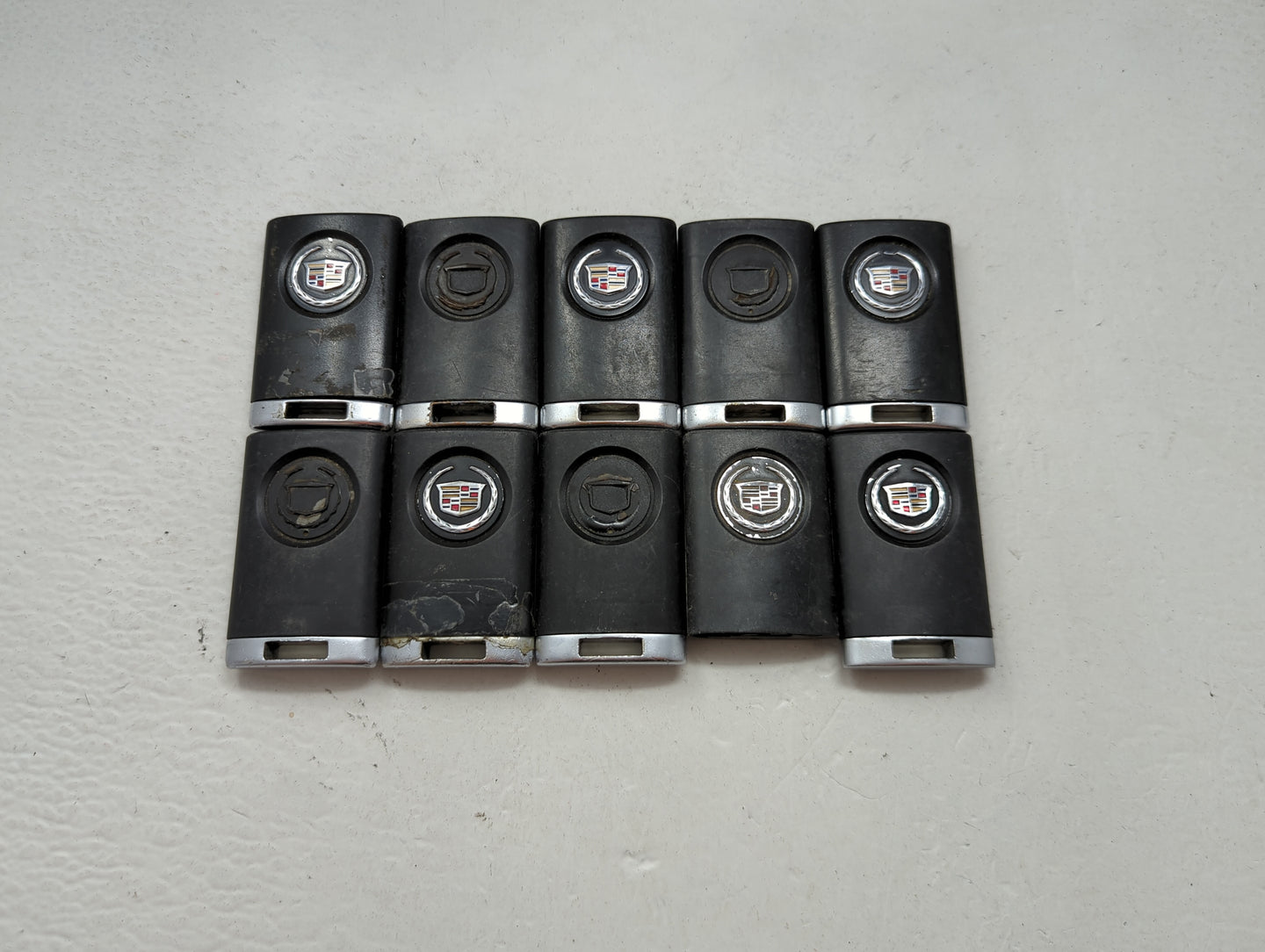 Lot of 10 Cadillac Keyless Entry Remote Fob MIXED FCC IDS MIXED PART 1476196 - Oemusedautoparts1.com
