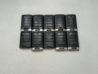 compare product Lot of 10 Cadillac Keyless Entry Remote Fob MIXED FCC IDS MIXED PART 1476199