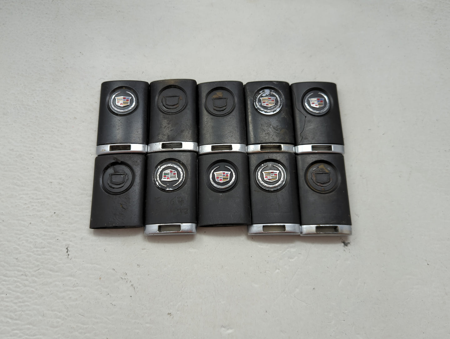 Lot of 10 Cadillac Keyless Entry Remote Fob MIXED FCC IDS MIXED PART 1476199 - Oemusedautoparts1.com