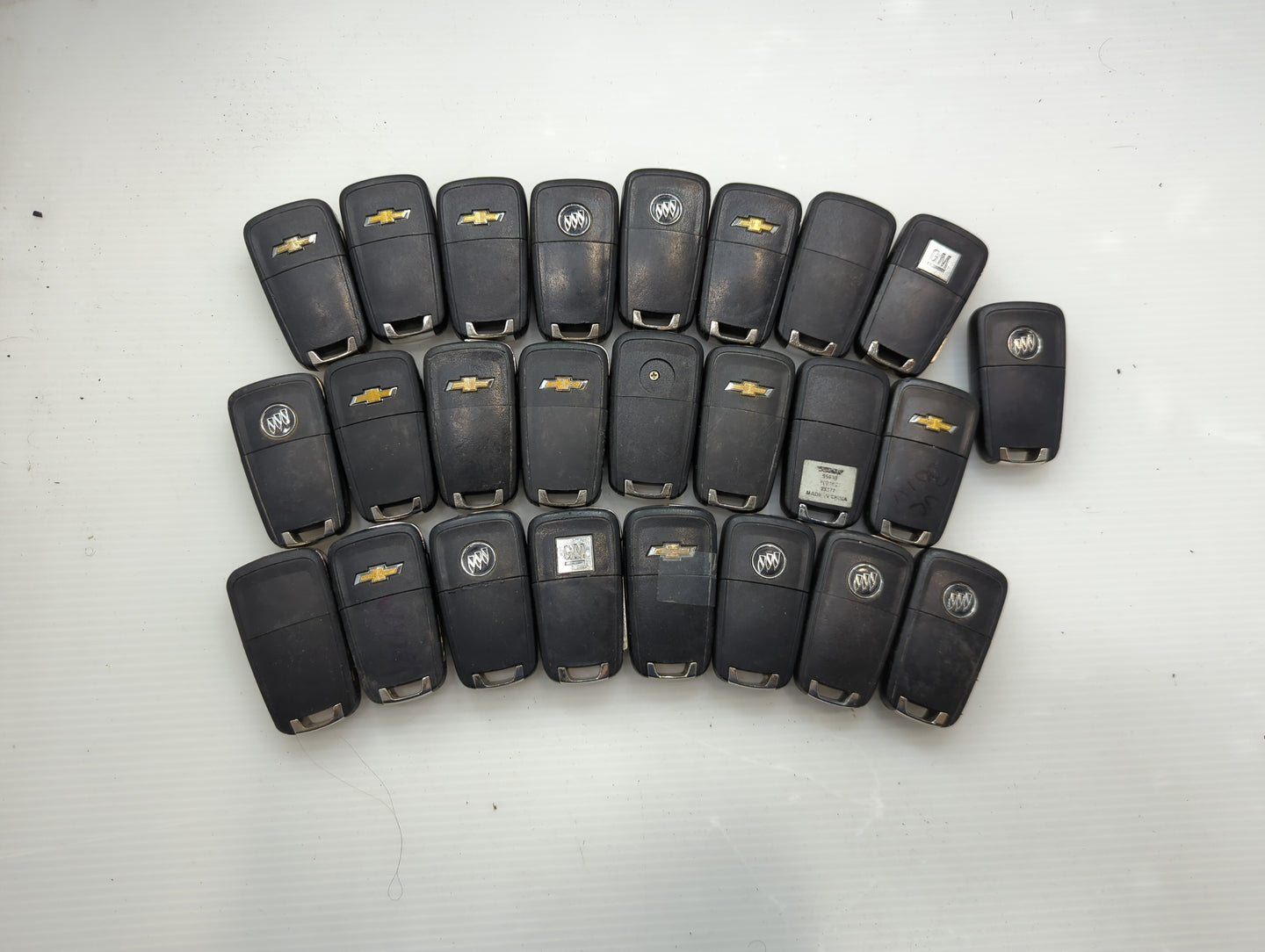 Lot of 25 Chevrolet Keyless Entry Remote Fob OHT01060512 | KR55WK50073 - Oemusedautoparts1.com