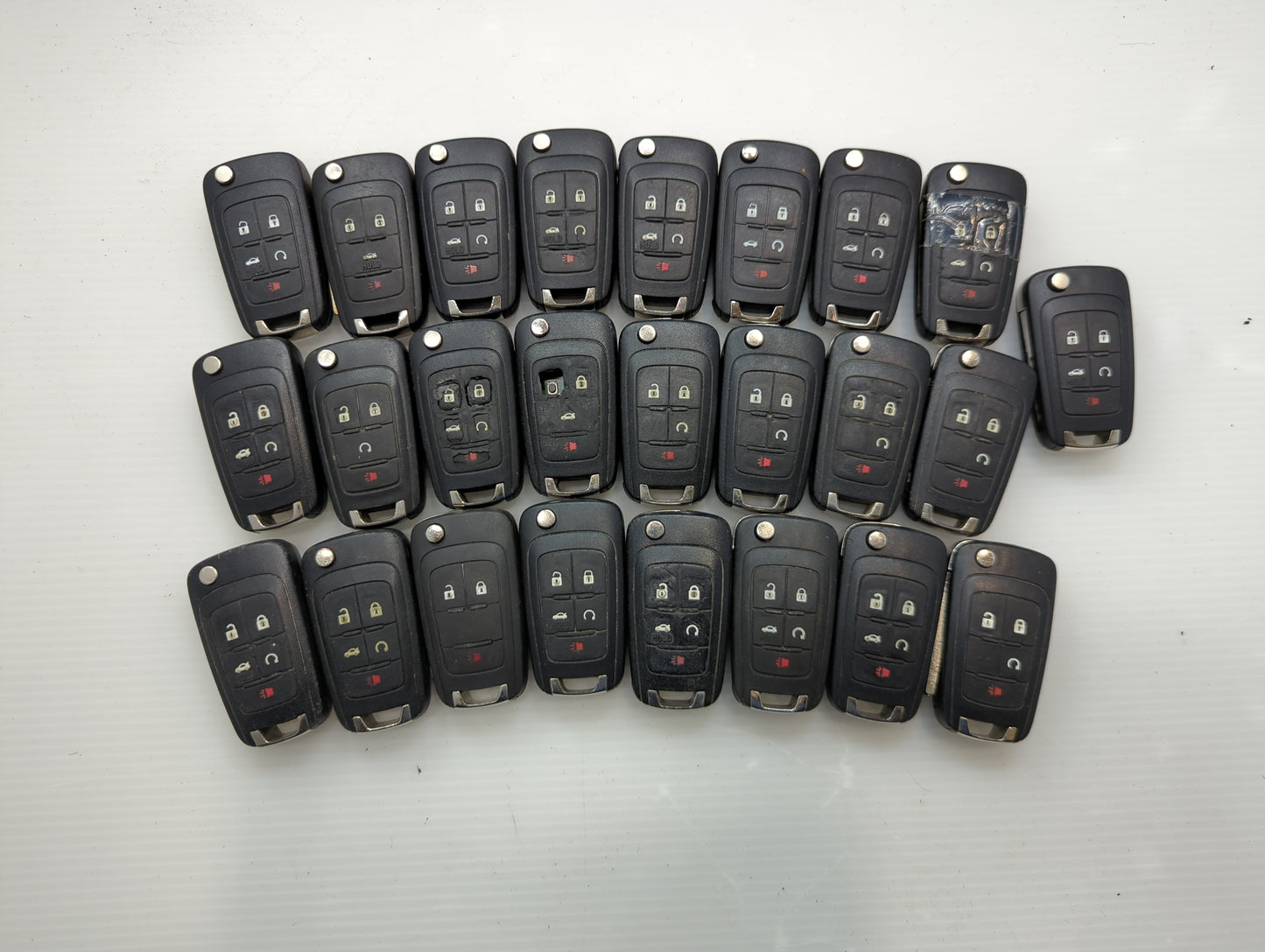 Lot of 25 Chevrolet Keyless Entry Remote Fob OHT01060512 | V2T01060514 - Oemusedautoparts1.com