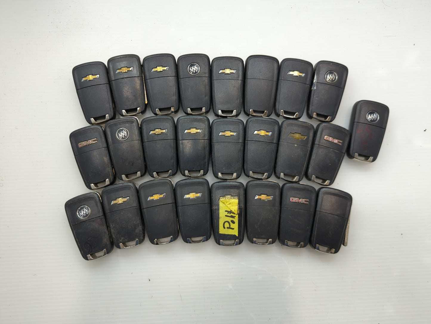 Lot of 25 Chevrolet Keyless Entry Remote Fob OHT01060512 | V2T01060514 - Oemusedautoparts1.com